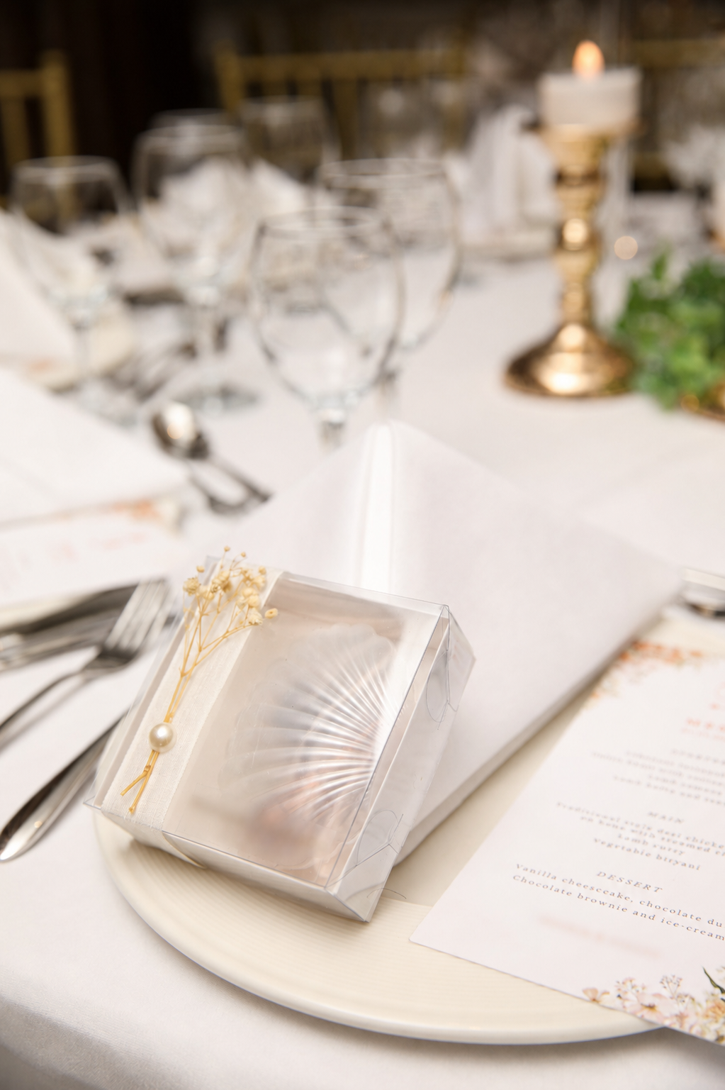 A personalised wedding favour from Turkey and menu card, finished with soft floral details.