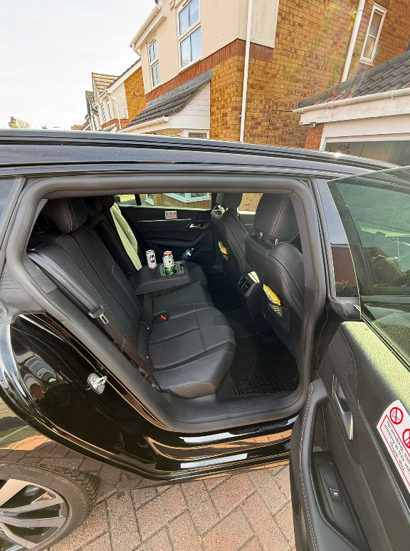 Spacious rear cabin with drinks ready for your journey