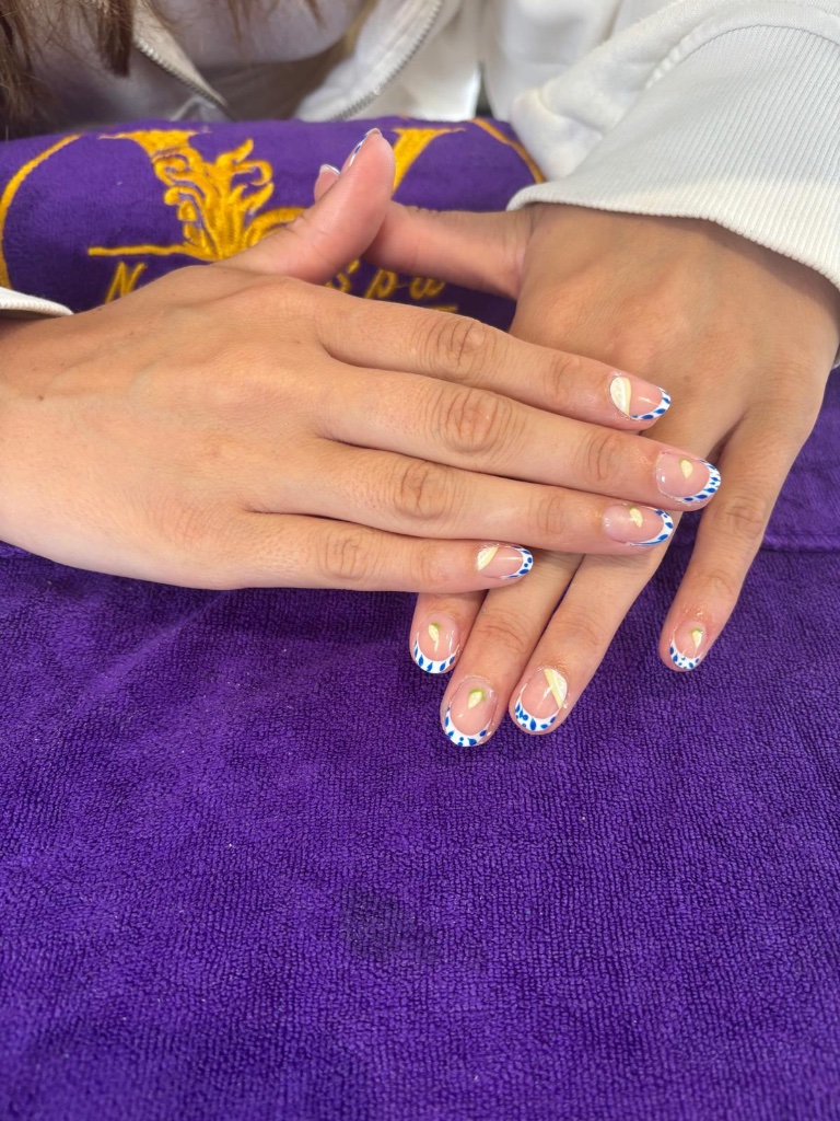 French manicure with blue dot nail art