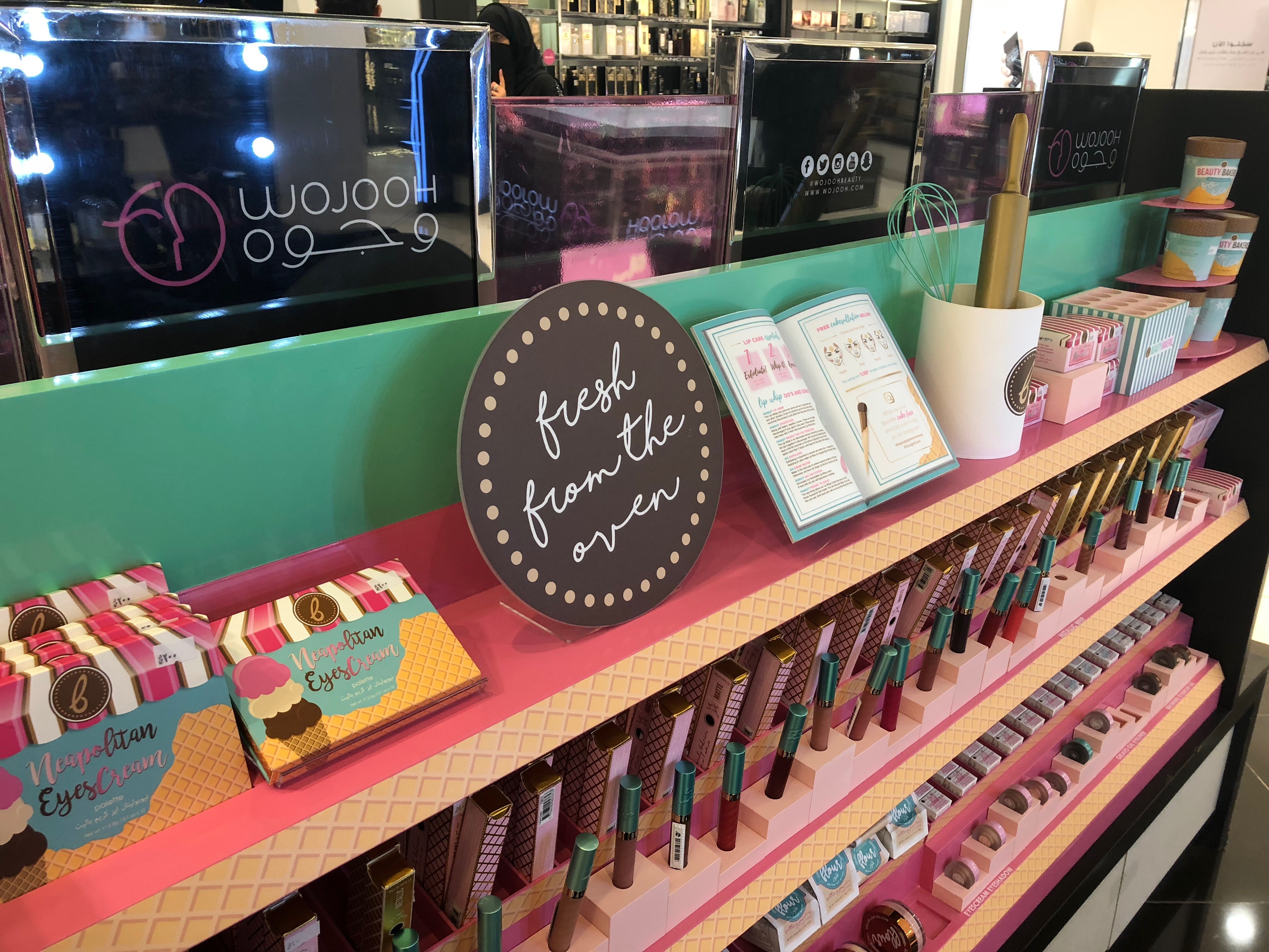 Beauty Bakerie bakery-themed display with Wojooh shelving in an international retail store