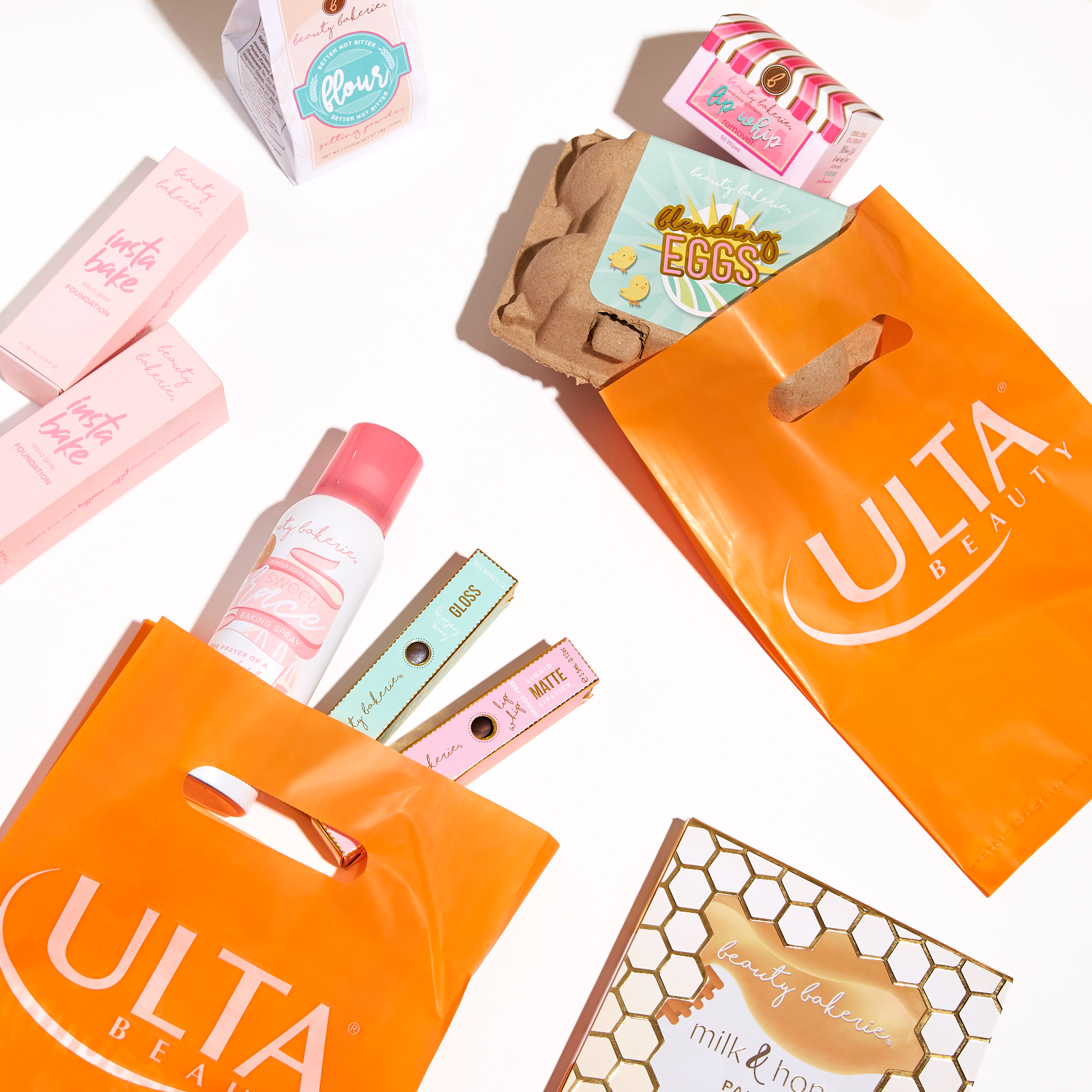 Beauty Bakerie products flat lay with Ulta Beauty shopping bags