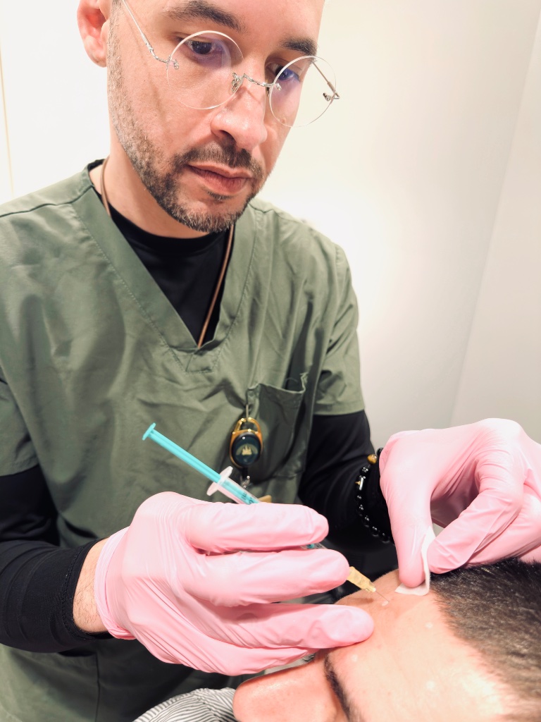 Frontalis neurotoxin treatment