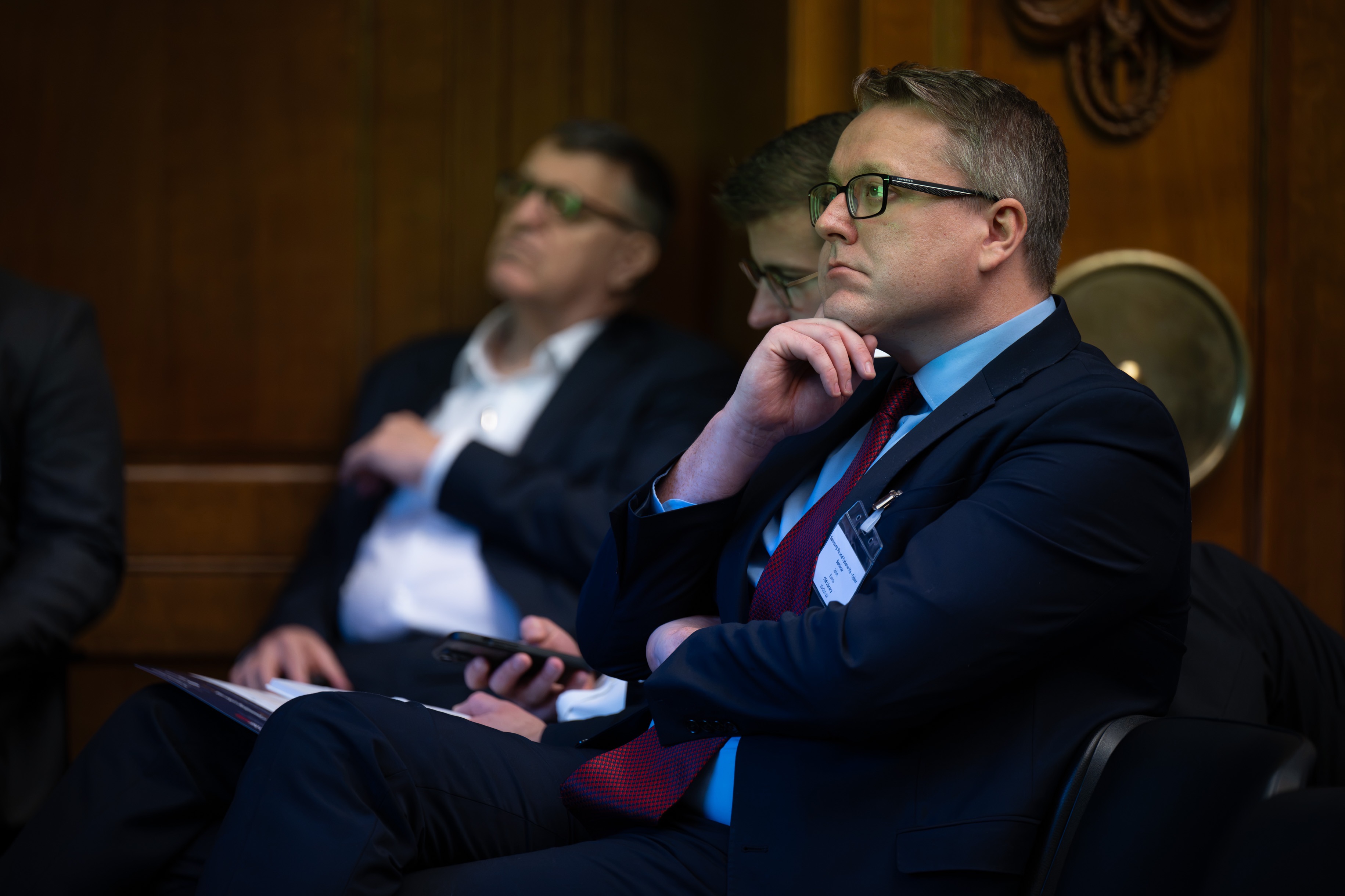 Attendees listening during the fireside chat.