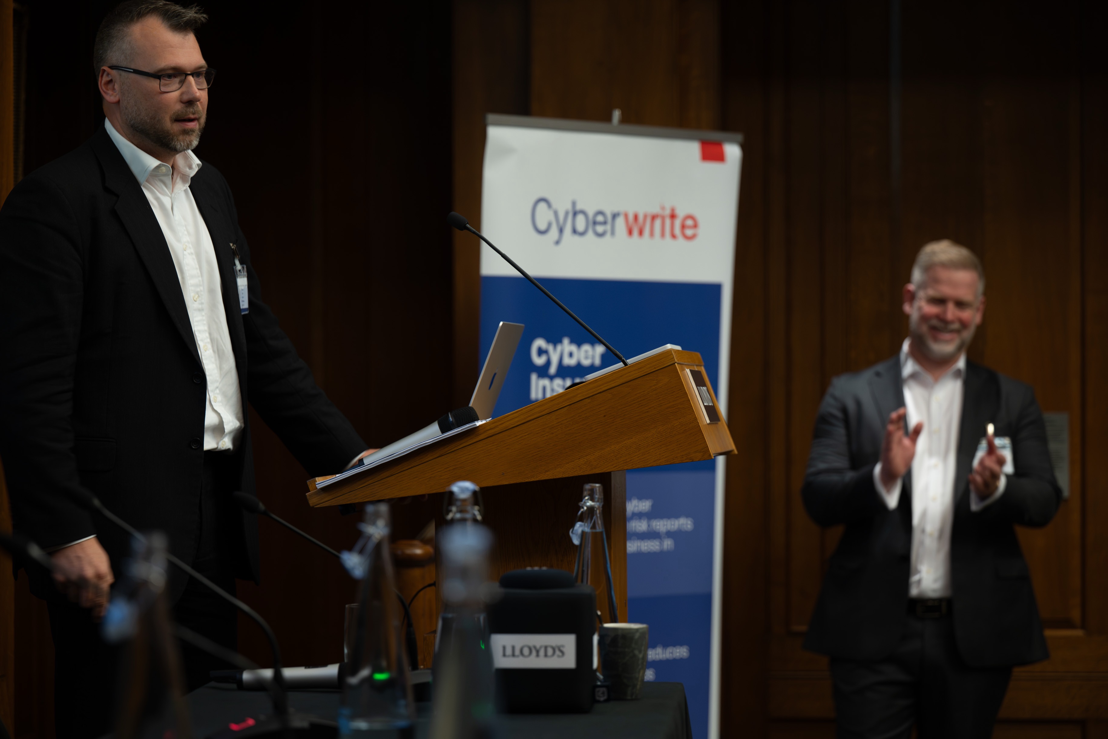 Applause at the close of a talk.