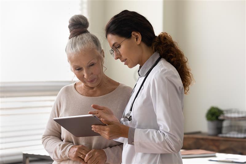 Elderly patient and caregiver
