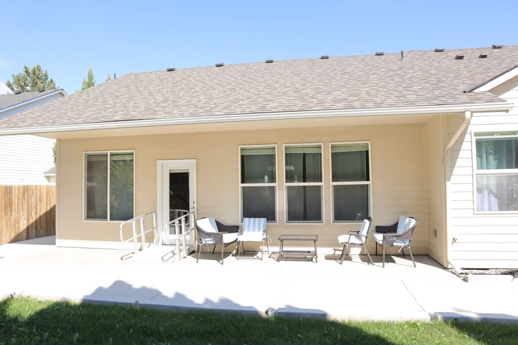 Covered back patio with seating