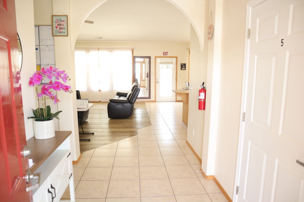Welcoming entryway with orchid