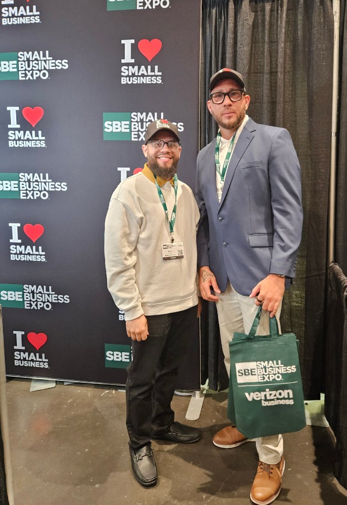 NJTECHLAND LLC team members networking at Small Business Expo New York City 2026 with SBE backdrop