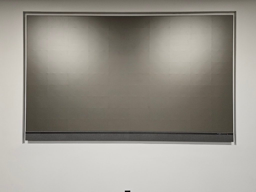dvLED video wall display blank before calibration — installed in corporate office wall recess