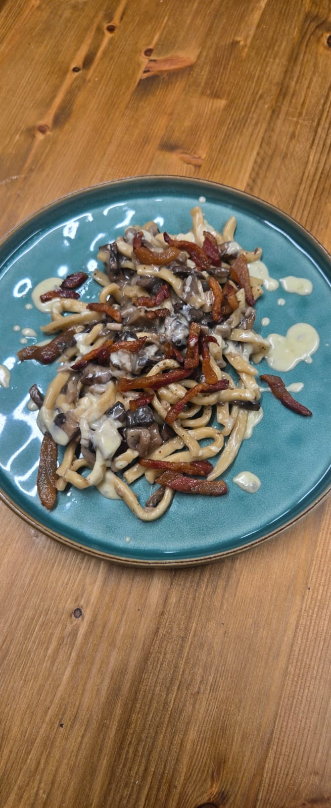 Pasta with creamy sauce and mushrooms