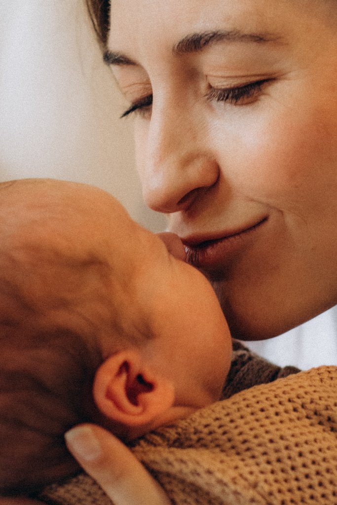 Mother and newborn, nose to nose