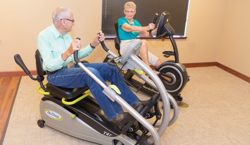 Residents using exercise equipment