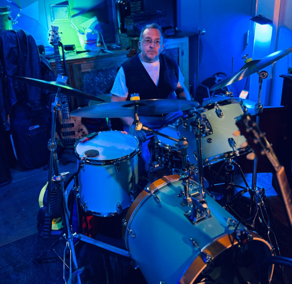 Drummer with blue lighting