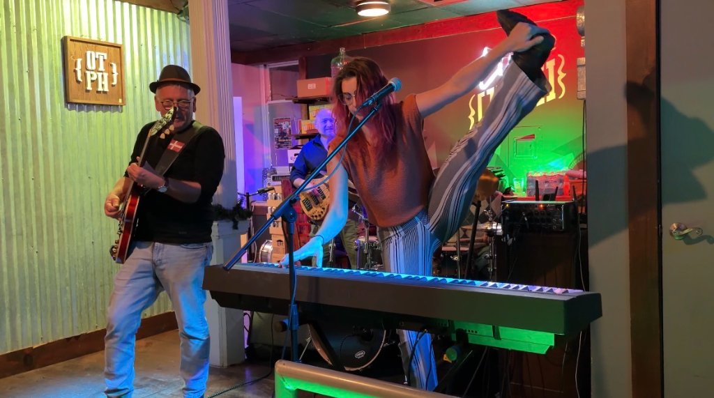 Singer and guitarist on stage