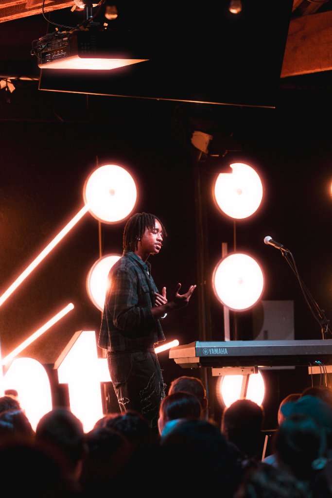 Soul Hemingway preaching with stage lighting