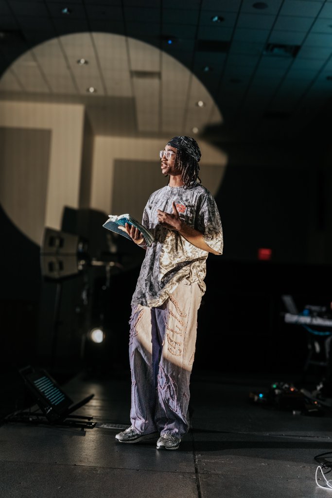 Soul Hemingway on stage with Bible at FUGE Camps JMU