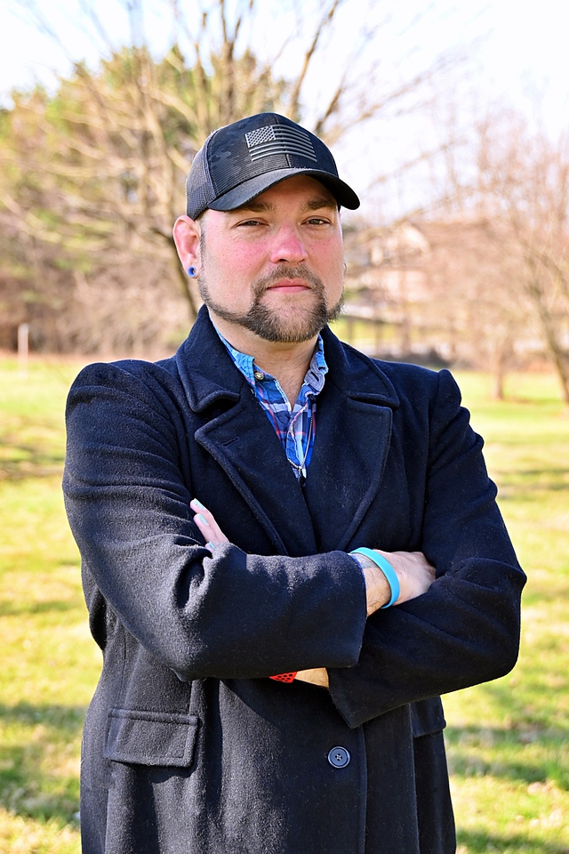 Thomas Johnson overlooking Pennsylvania's District 28 landscape at golden hour