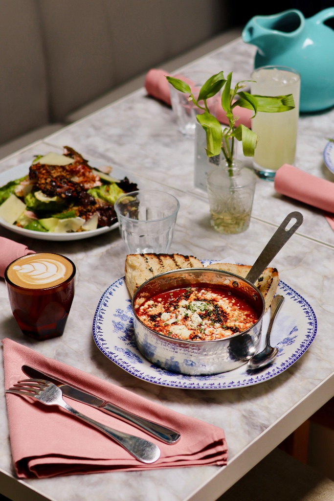 Shakshuka on marble table setting