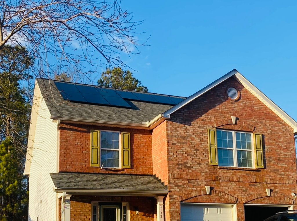 Brick Home — Clean Black Panels