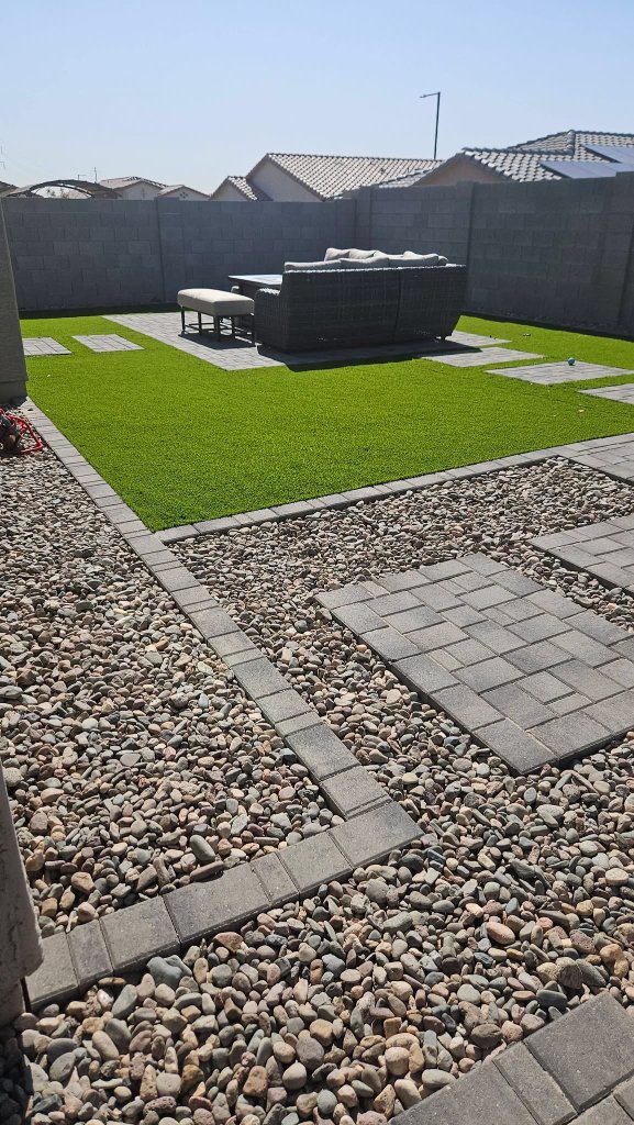 Paver pathway with gravel and artificial turf