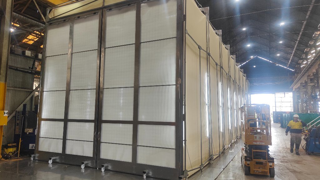 Extended industrial booth — exterior view