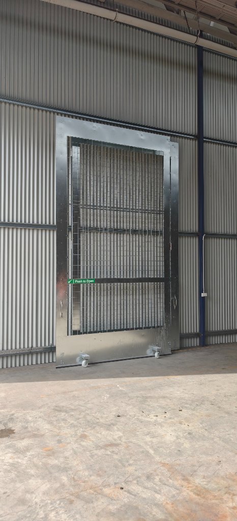 Huge front doors — so stable they roll on their own before bolting up