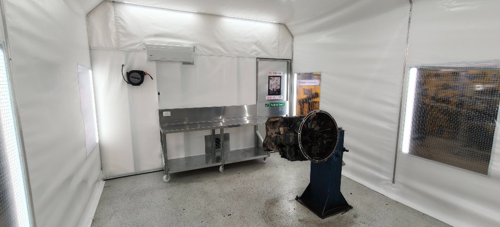 Clean room interior with engine on stand
