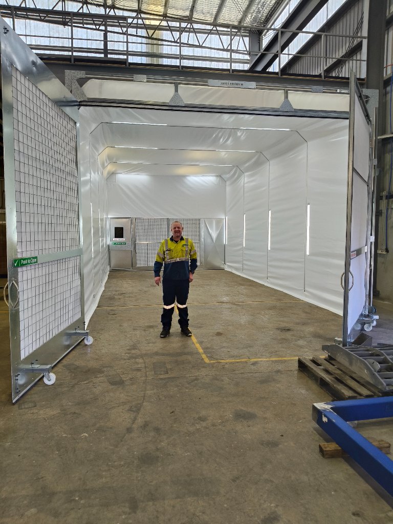 Interior — front entry view with worker