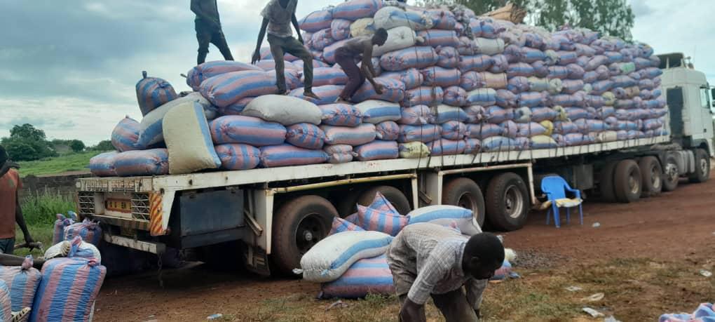 Flatbed truck fully loaded with commodity sacks