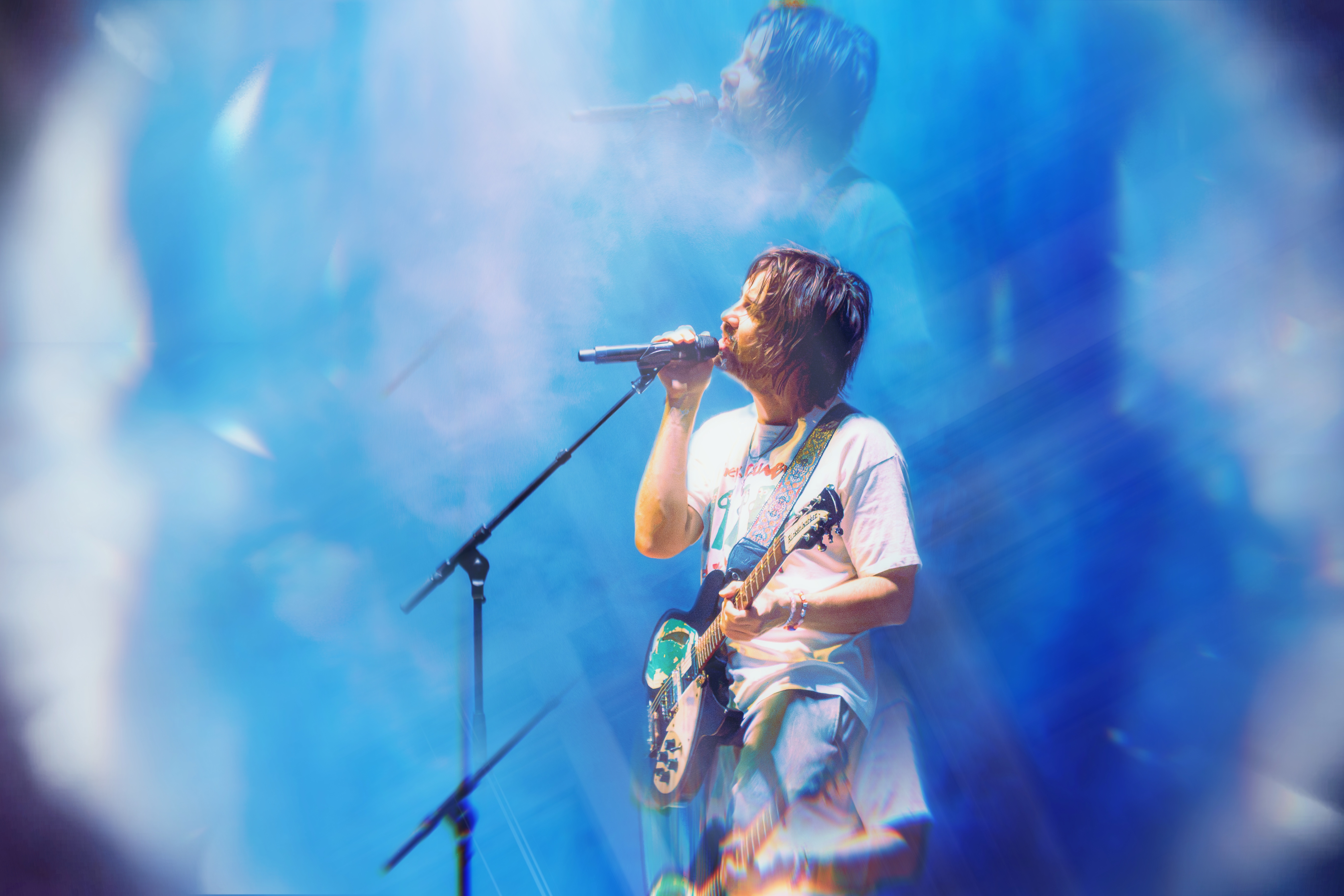 Tame Impala performing on the Deadbeat Tour at Mortgage Matchup Center in Phoenix, Arizona — photograph 4 by Anthony Cavale