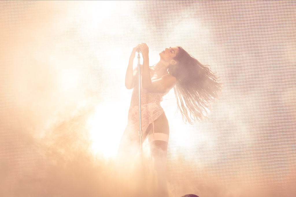Dua Lipa performing during the The Radical Optimism Tour at Kia Forum in Los Angeles, CA — concert photography by Anthony Cavale for Cavale Live