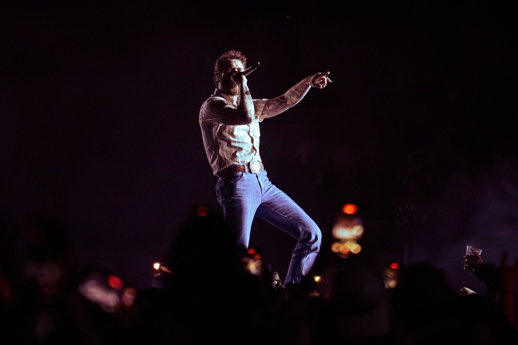 Post Malone performing during the The Big Ass Stadium Tour at State Farm Stadium in Glendale, AZ — concert photography by Anthony Cavale for Cavale Live