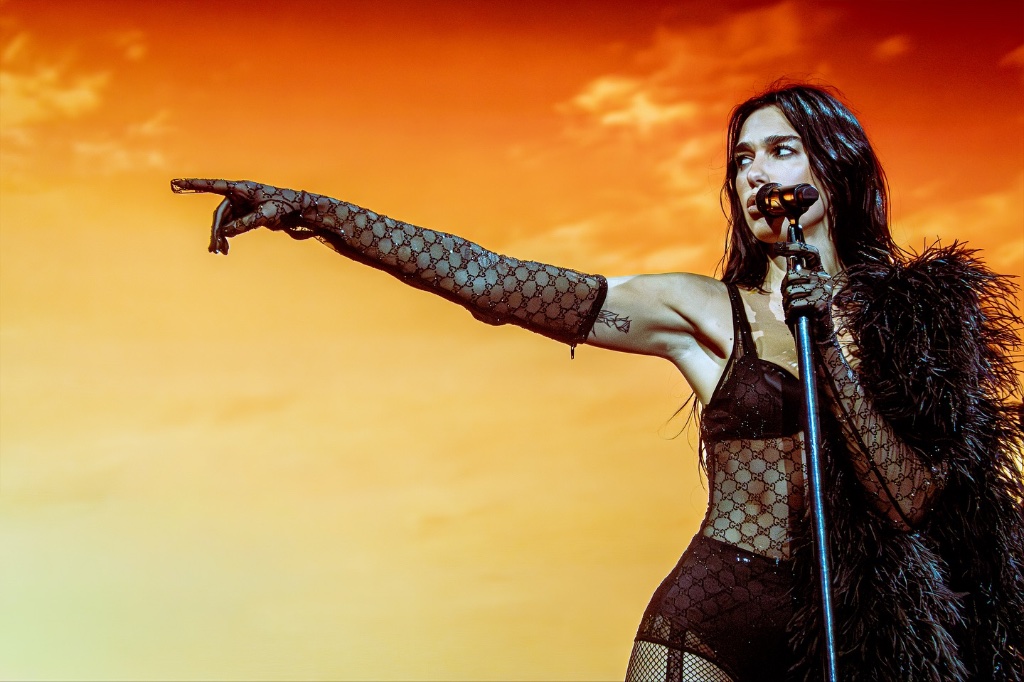 Dua Lipa performing during the The Radical Optimism Tour at Kia Forum in Los Angeles, CA — concert photography by Anthony Cavale for Cavale Live