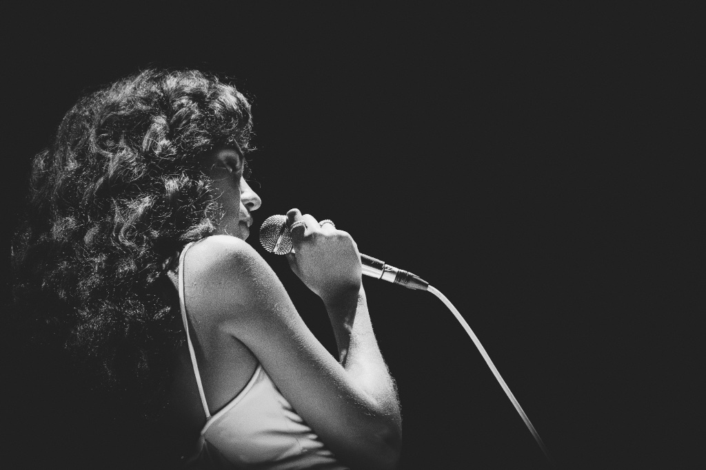 Olivia Dean performing during the The Art of Loving Tour at Crypto.com Arena in Los Angeles, CA — concert photography by Anthony Cavale for Cavale Live