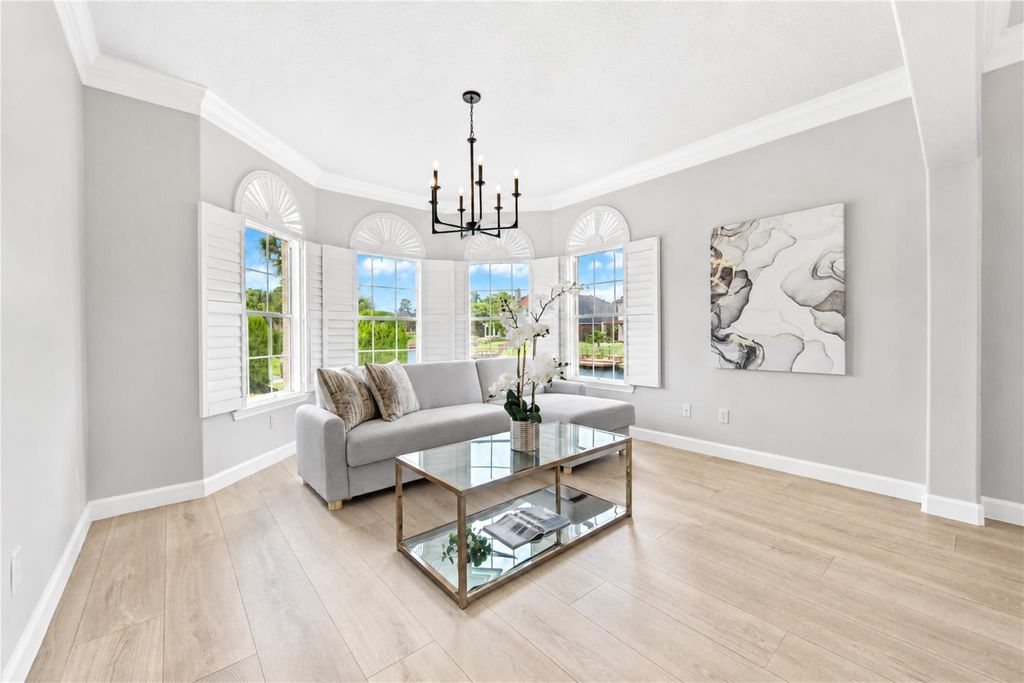 Living room with bay windows