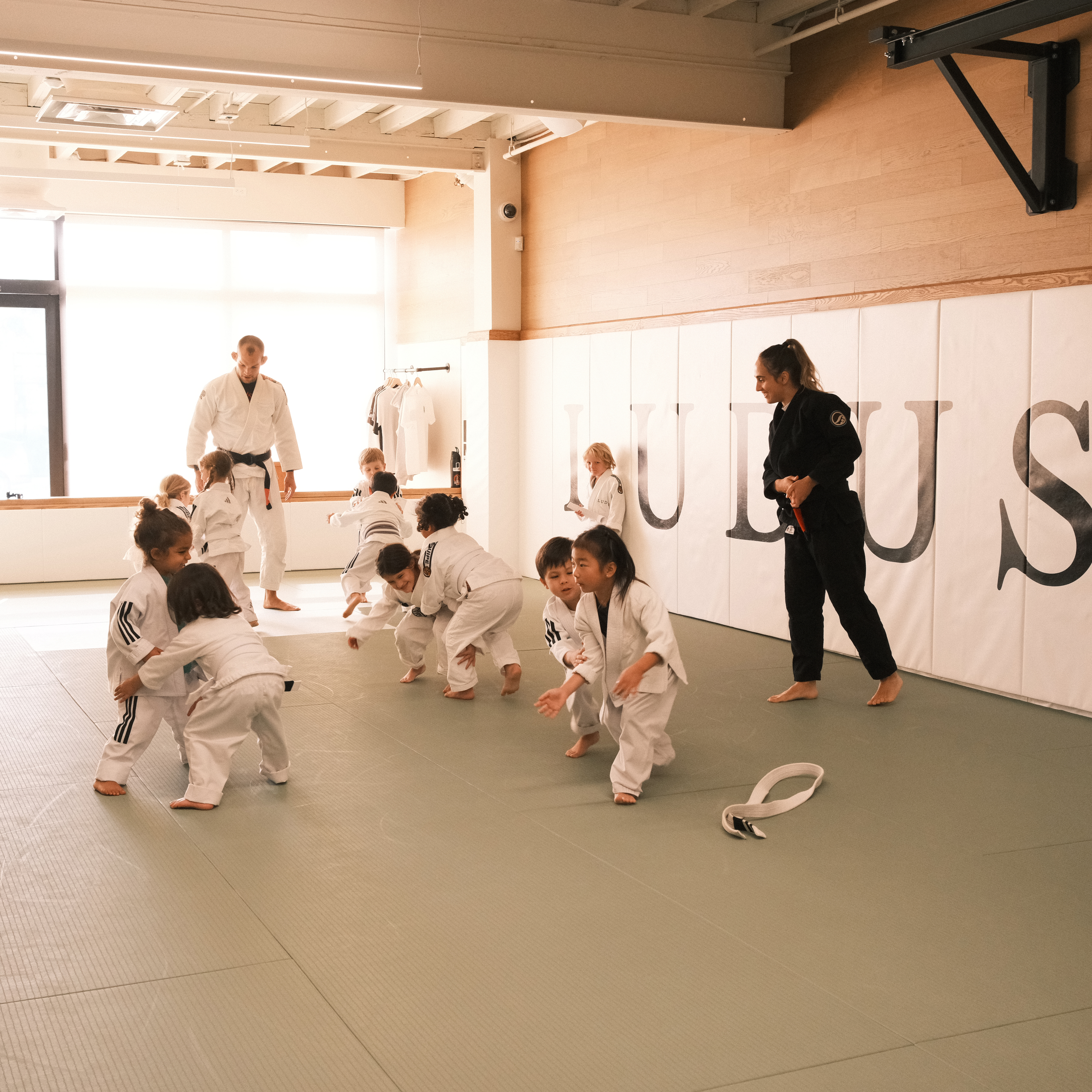 Kids drilling with coaches at LUDUS