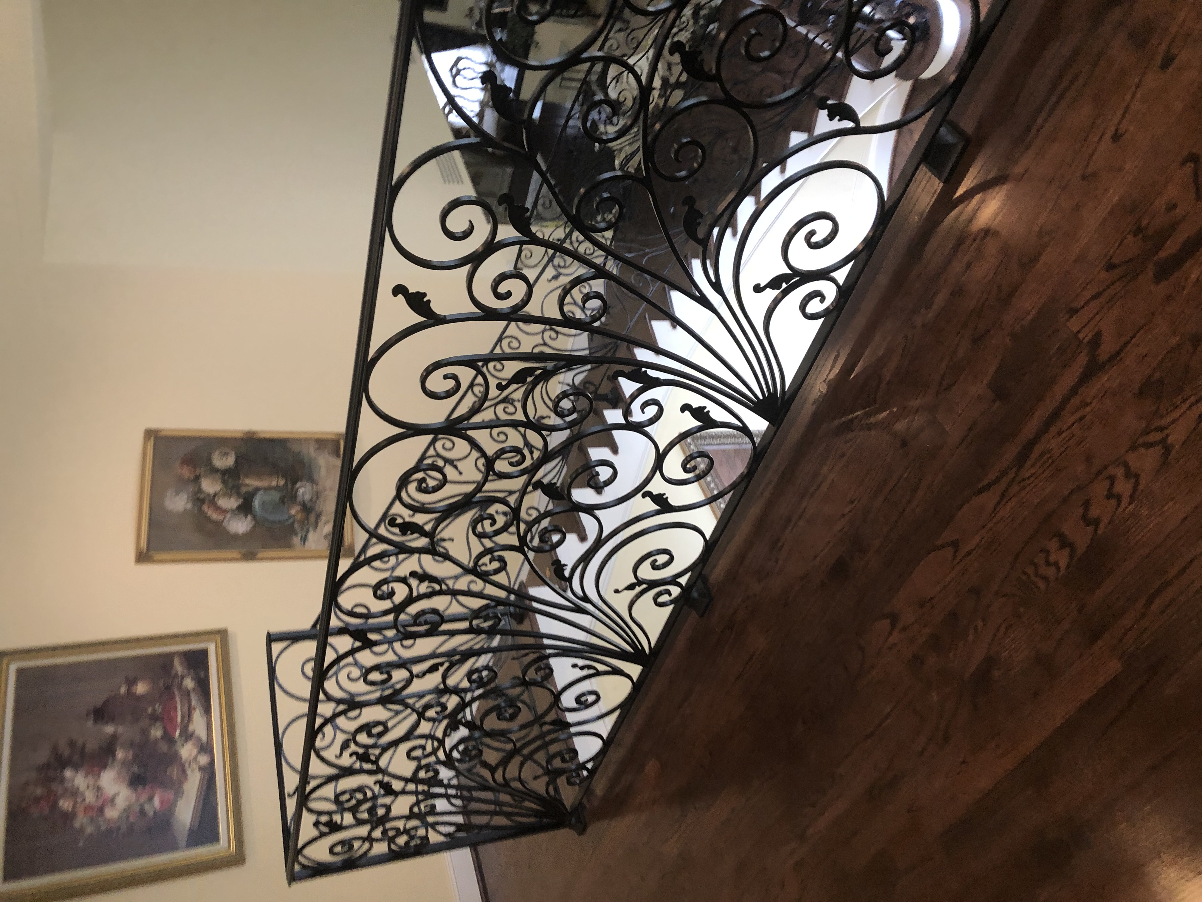 Ornate Scrollwork Iron Landing Railing