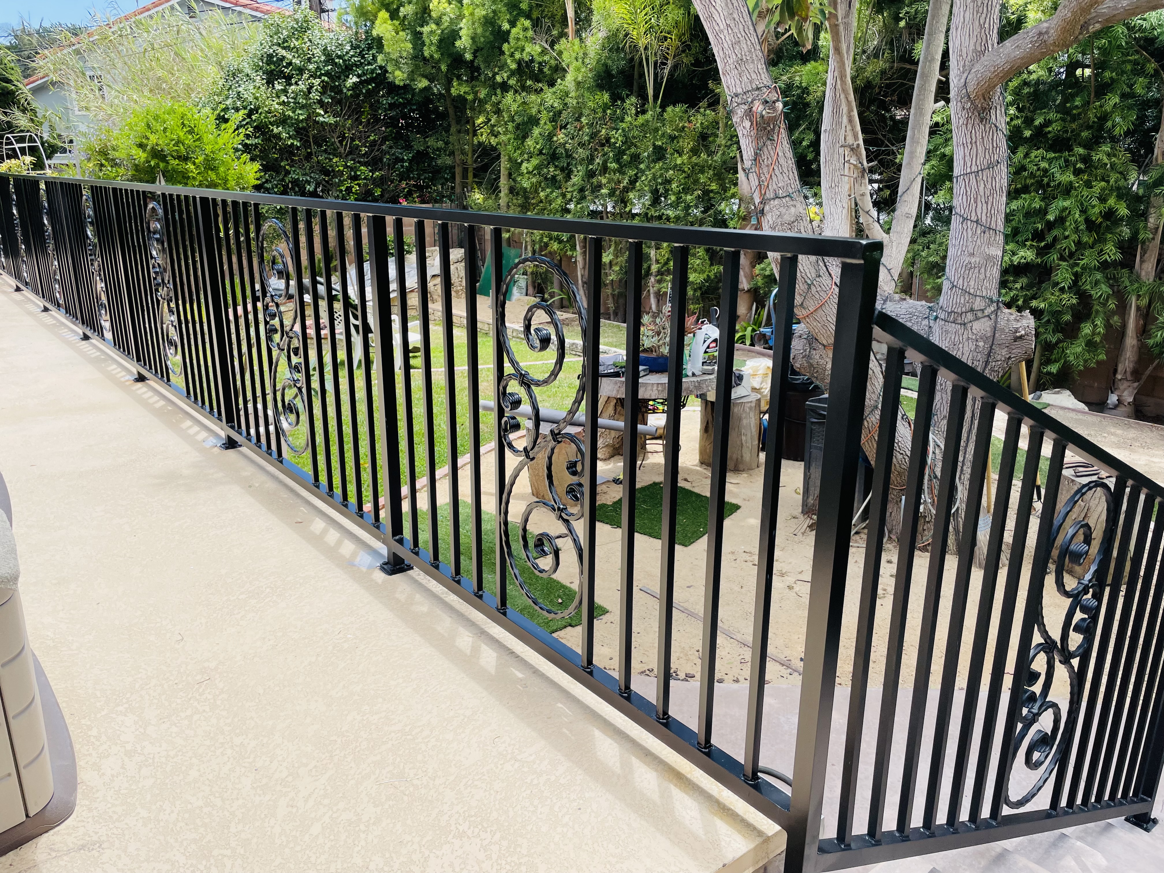 Iron Railing with Scrollwork Accent Panels