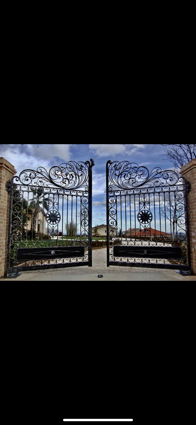 Custom iron gates fabricated and installed by Xtreme Iron Work
