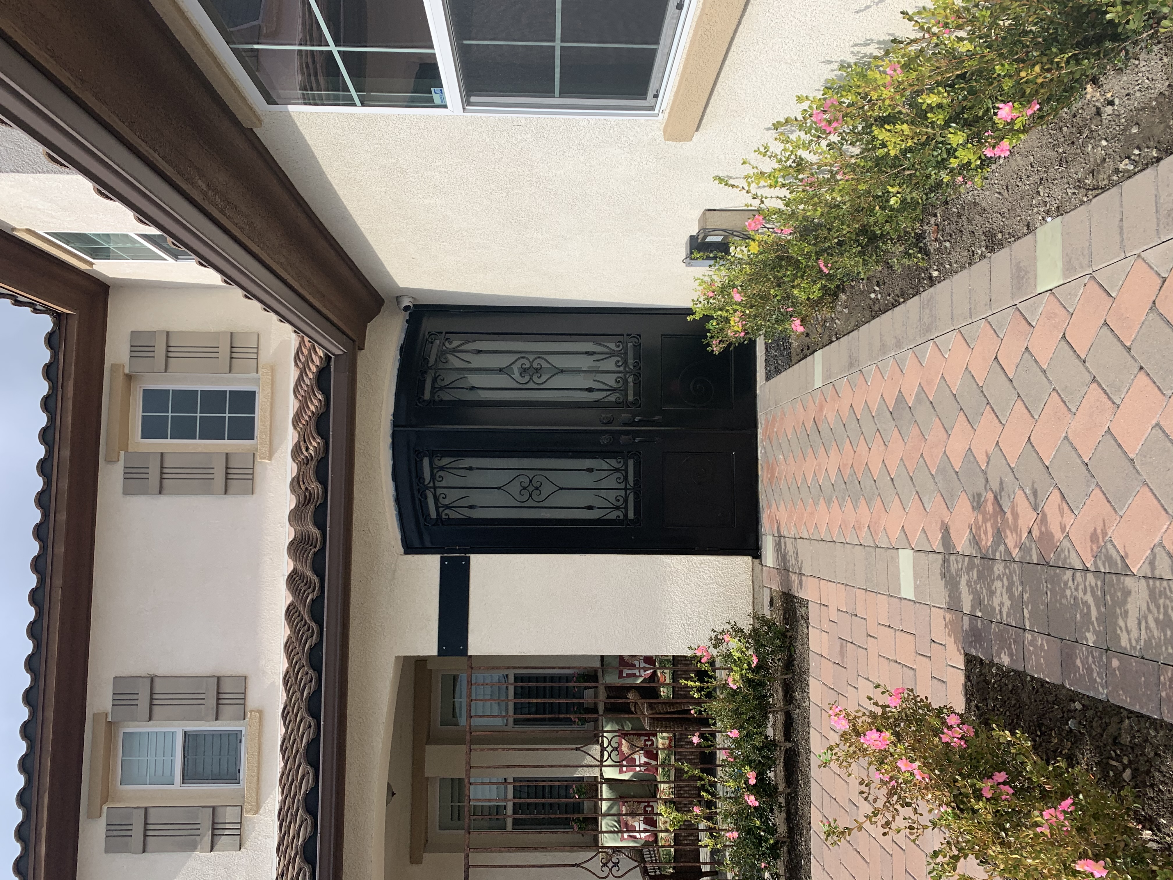 Arched Double Iron Door with New Construction Install