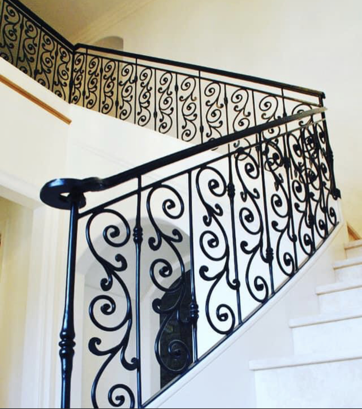 Dense Scrollwork Iron Staircase & Landing Railing
