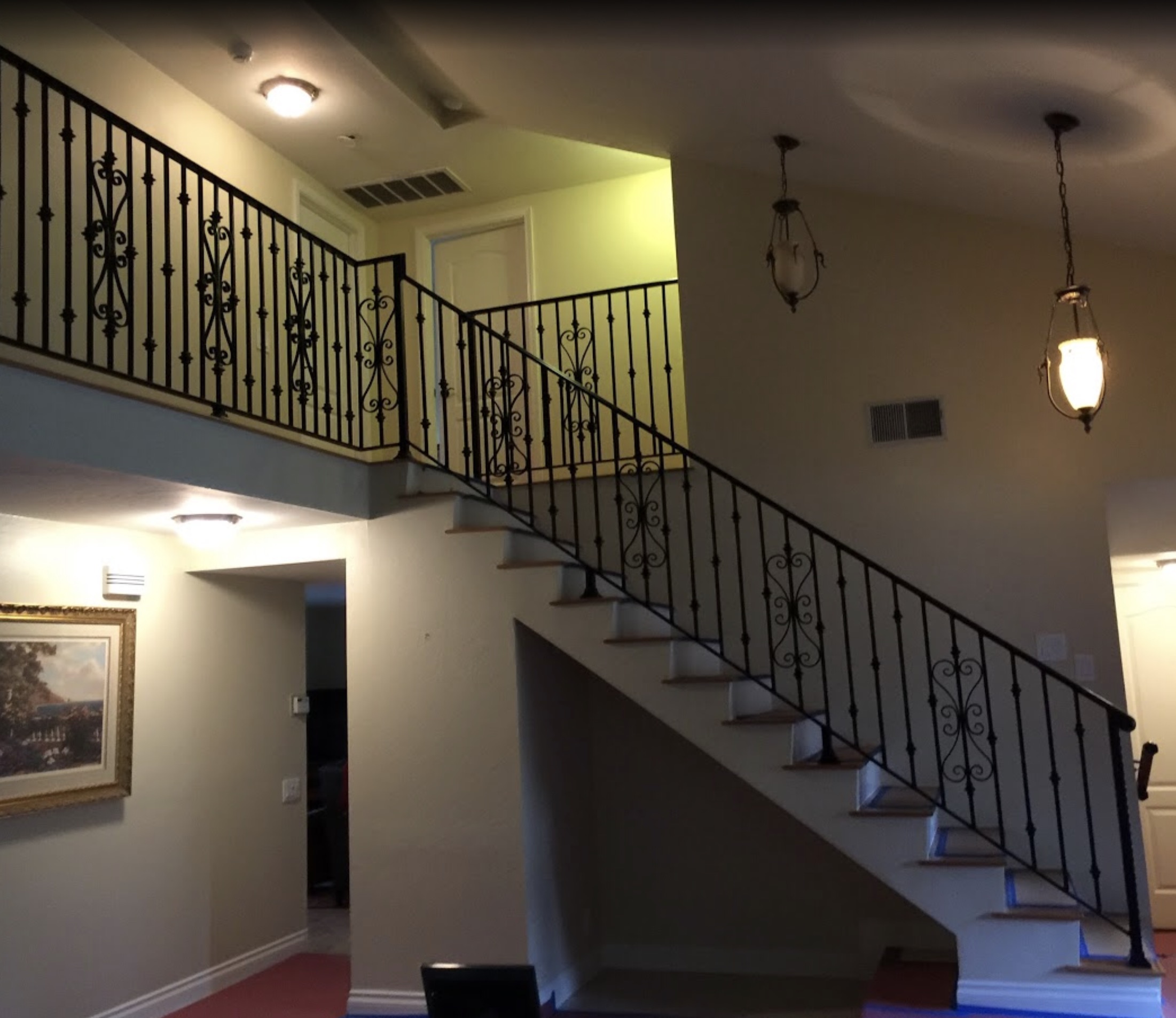 Double-Scroll Staircase Railing with Pendants