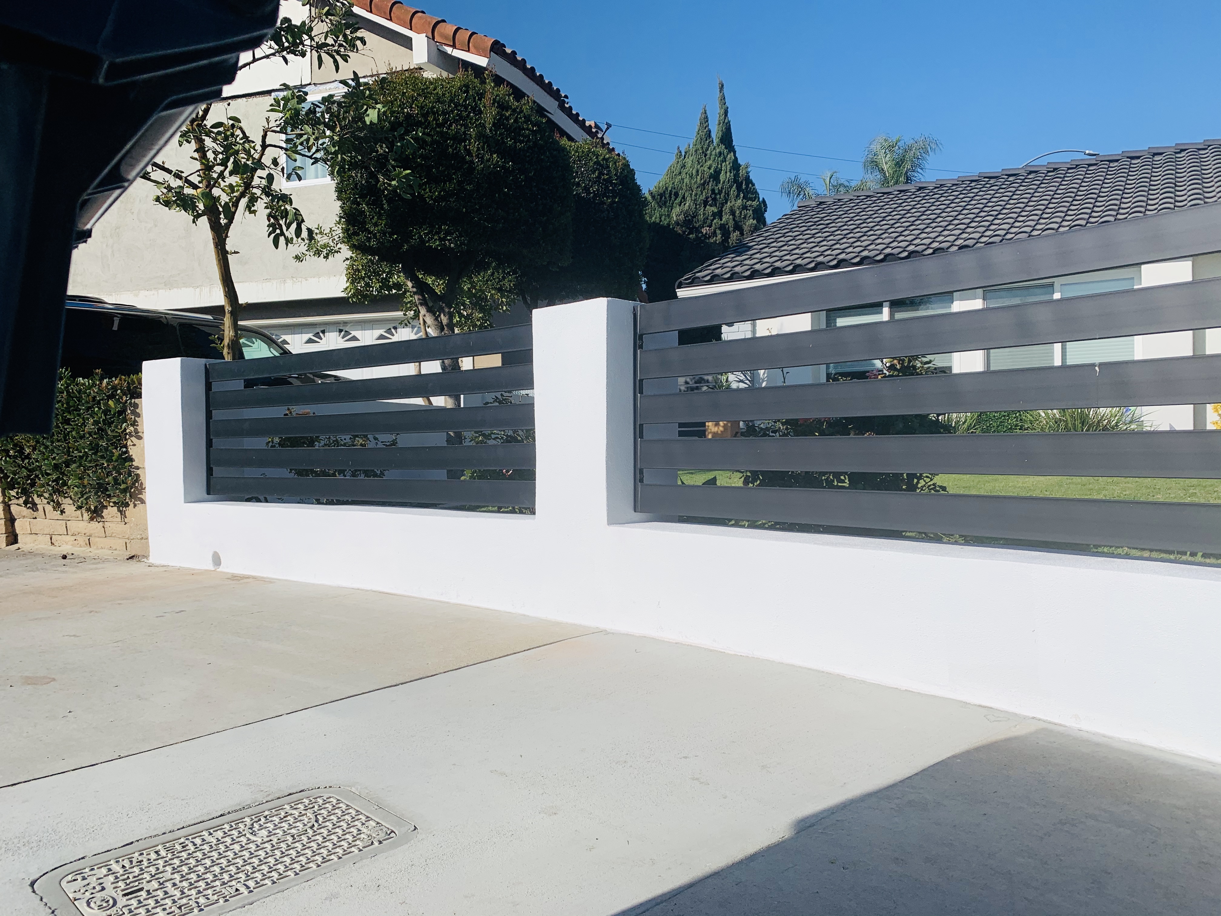 Modern Horizontal Metal & Concrete Fence