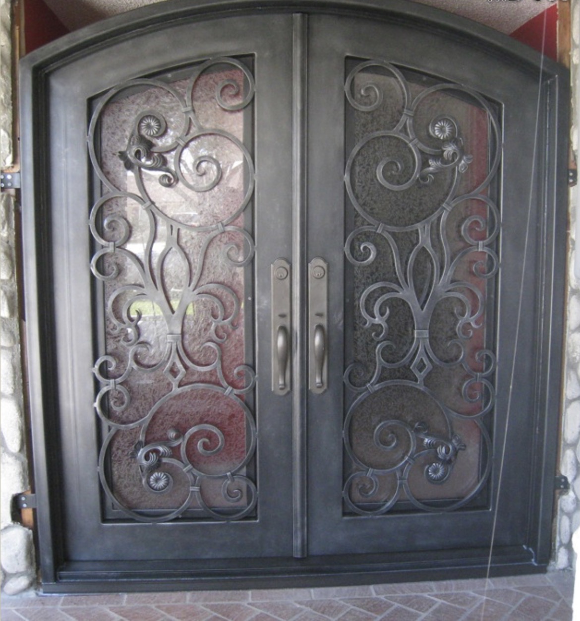Double Iron Door with Circle Scrollwork & Textured Glass