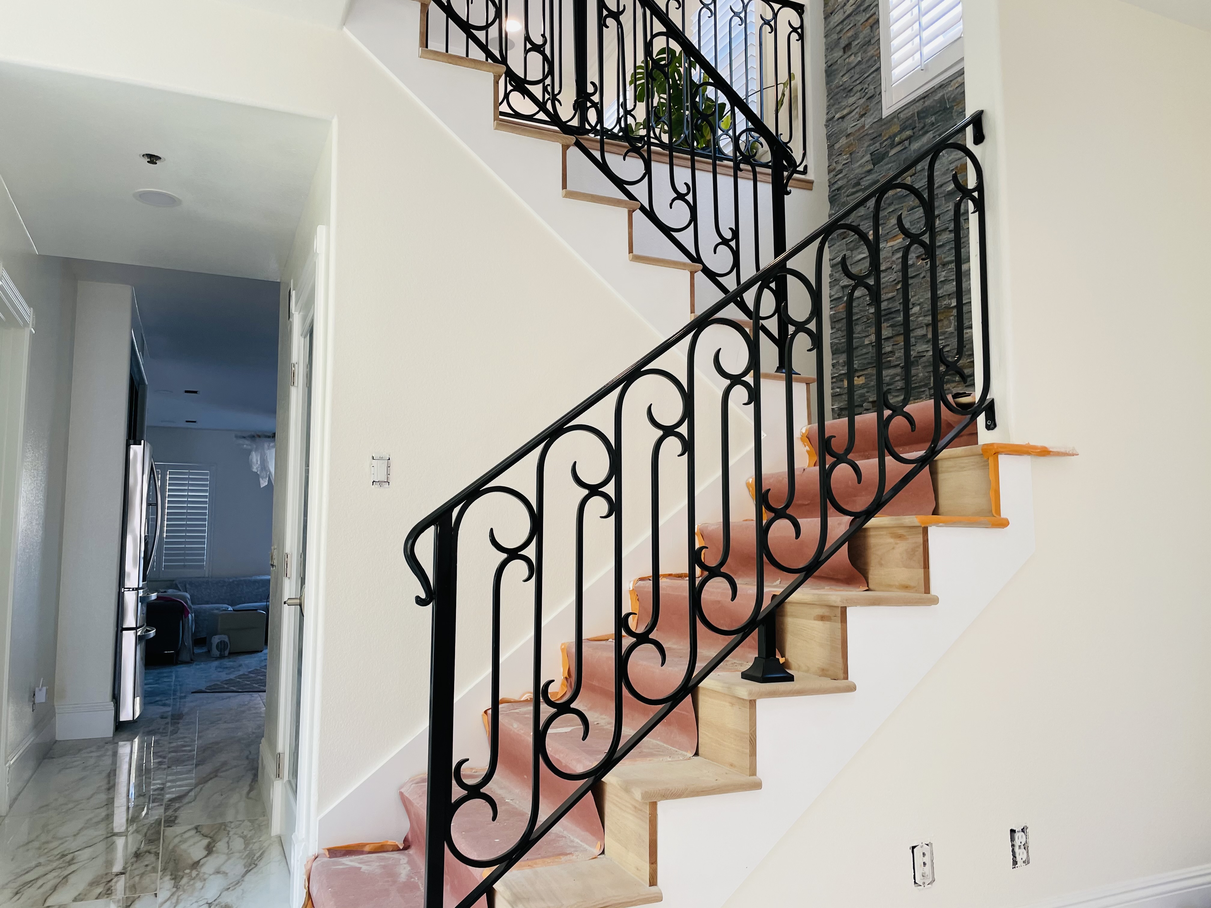 Scrollwork Staircase Railing Under Construction
