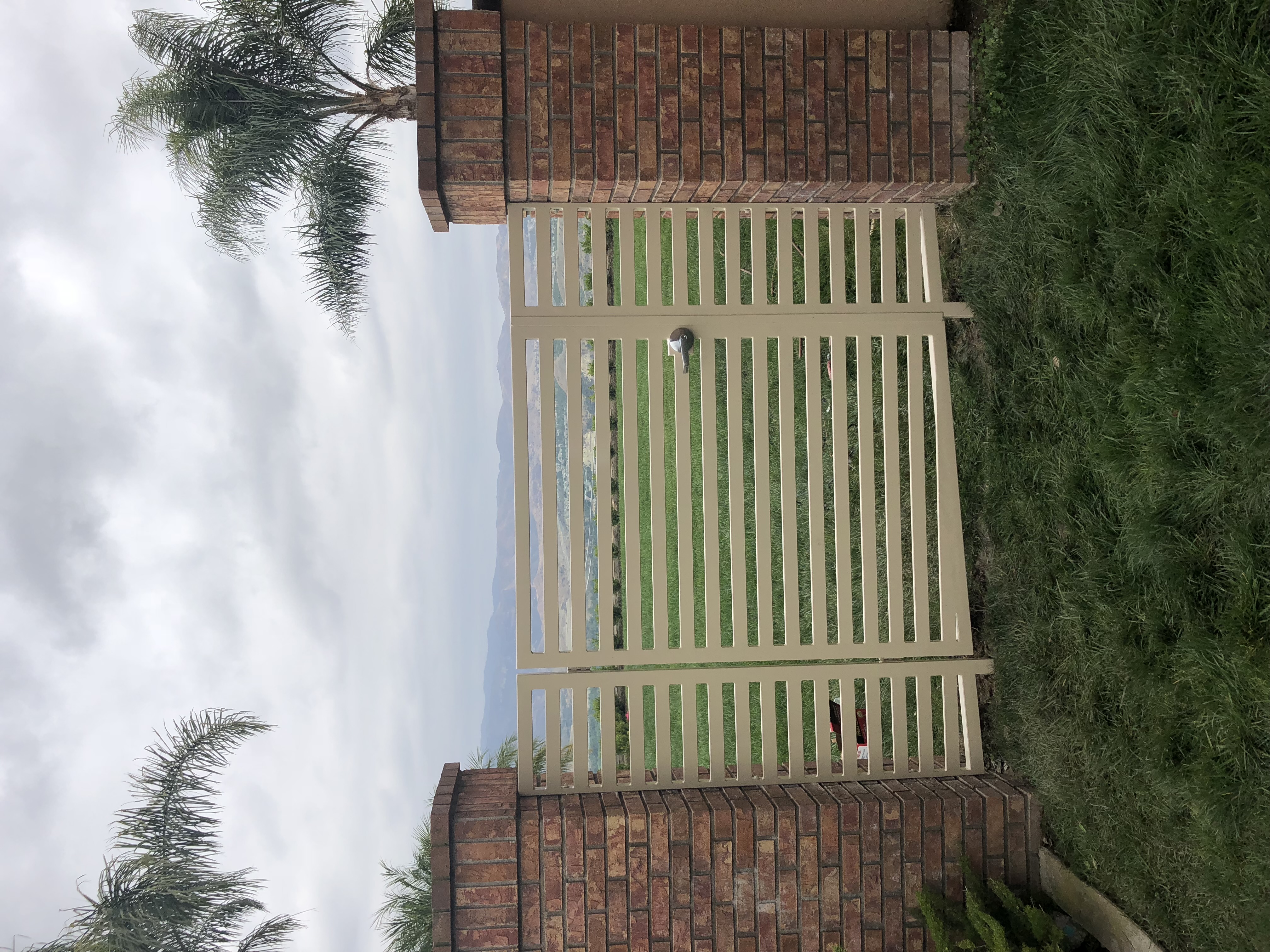 Curved Iron Porch Railing with Scrollwork