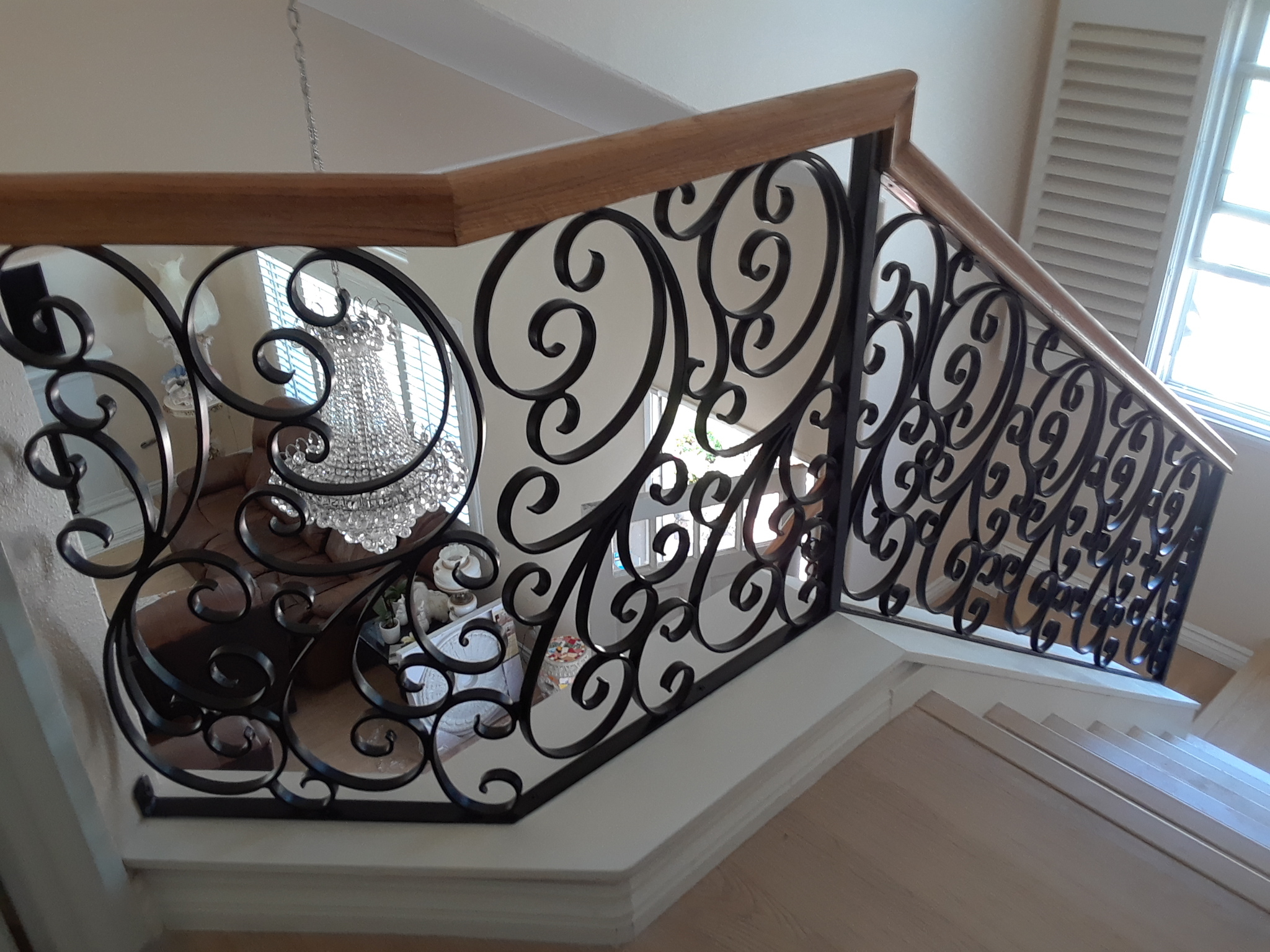 Scrollwork Landing Railing with Oak Handrail