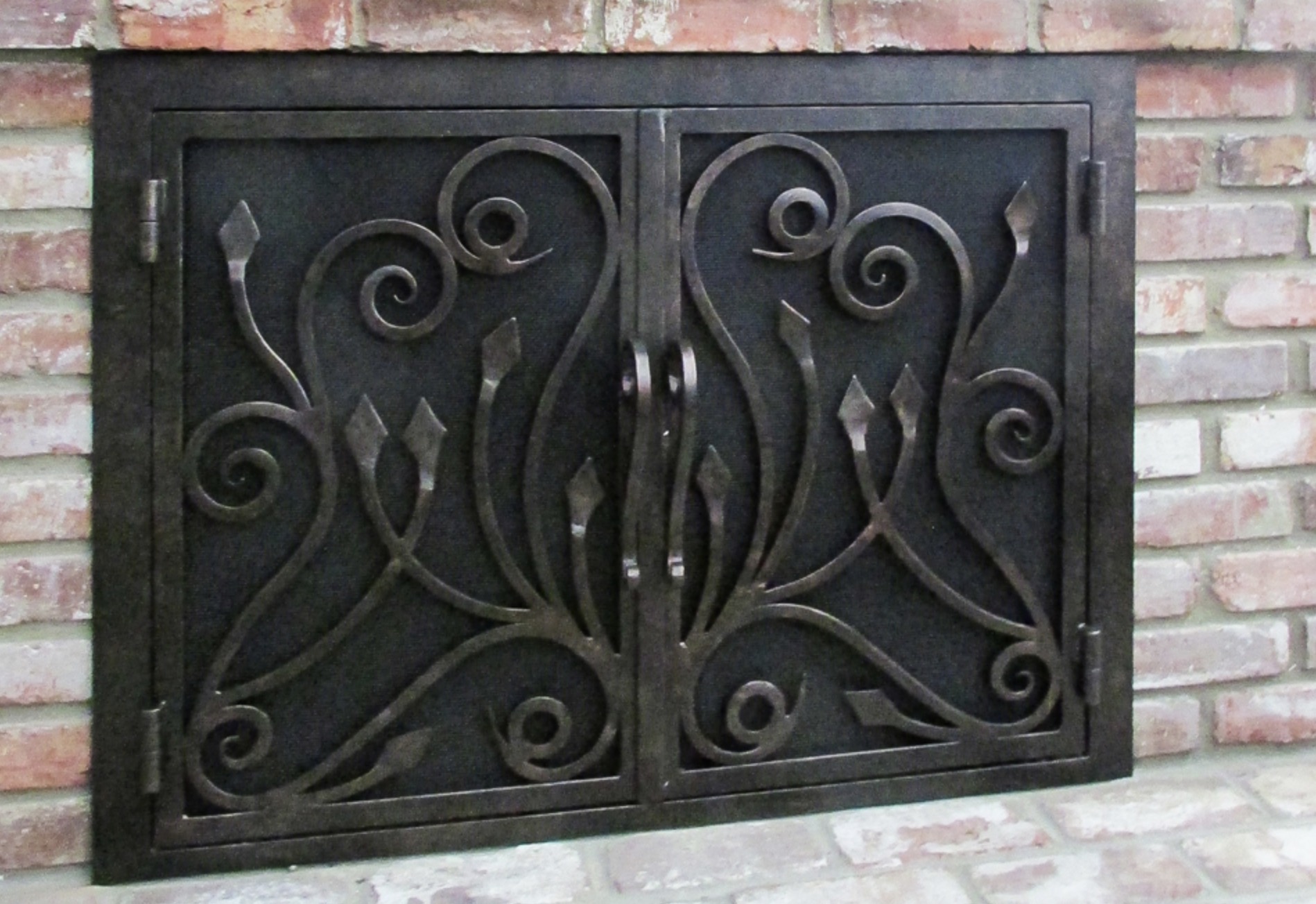 Arched Scrollwork Outdoor Fireplace Door