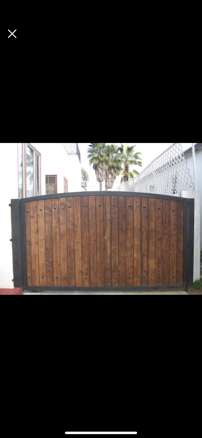 Arched Wood & Iron Driveway Gate