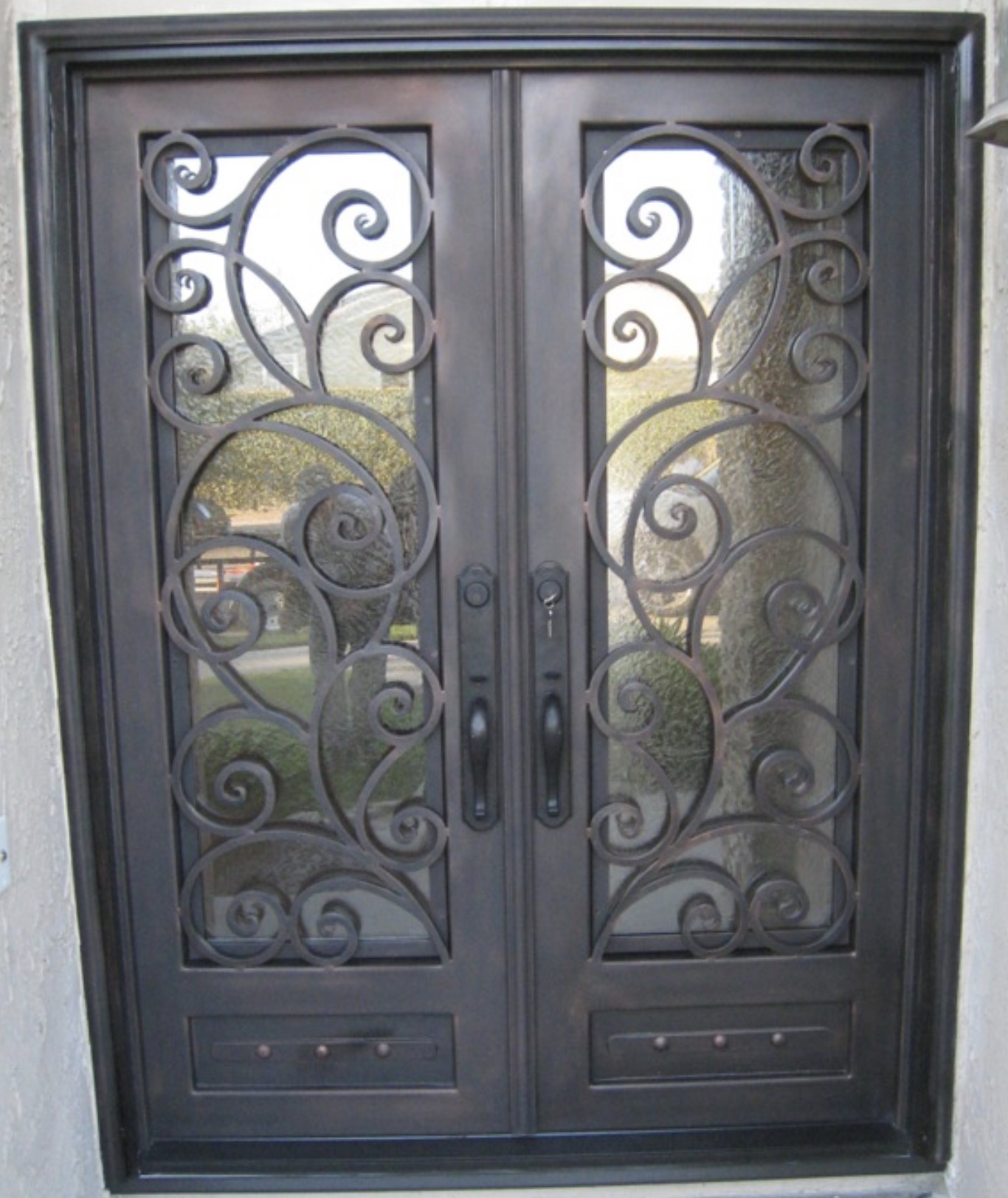 Double Iron Door with Large Scrollwork Glass